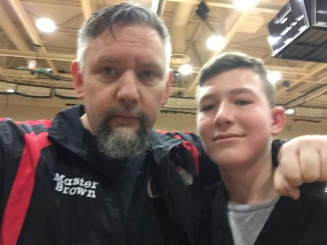 Master Brown with a student